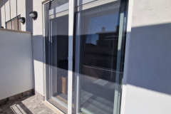 Zanzariera Sidney a molla con guida a terra